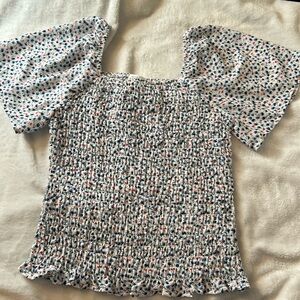 Square neckline cinched bodice exaggerated sleeved blouse